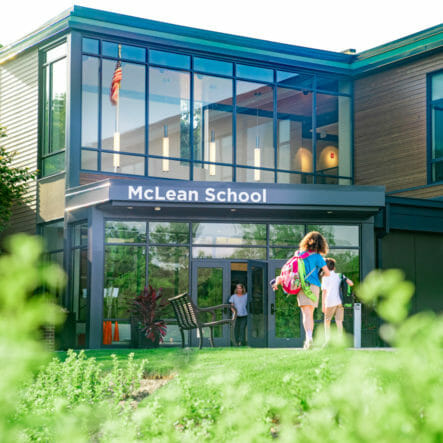 Students approach front door of McLean School