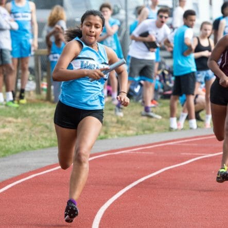 McLean varsity track and field runners on track