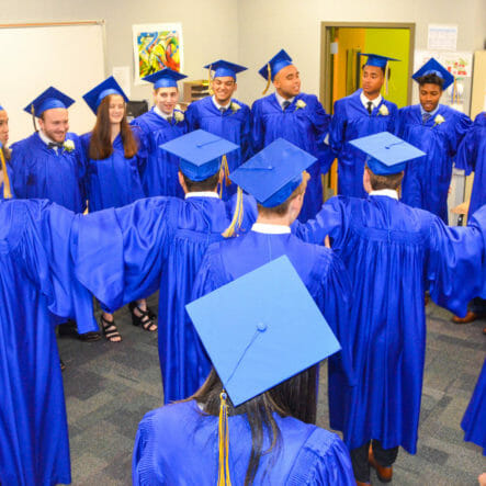 Graduating McLean seniors stand in a circle