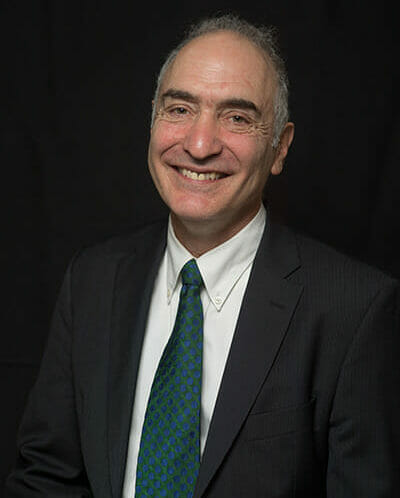 Michael Saxenian, Head of School at McLean School, smiles for camera