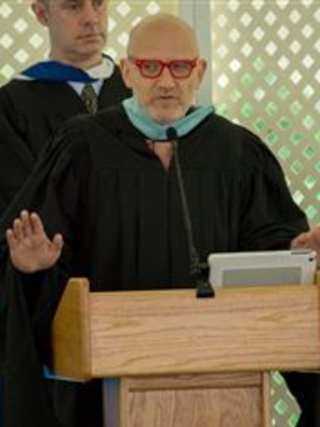 Richard Fisher, a History teacher at McLean, speaking during a commencement ceremony