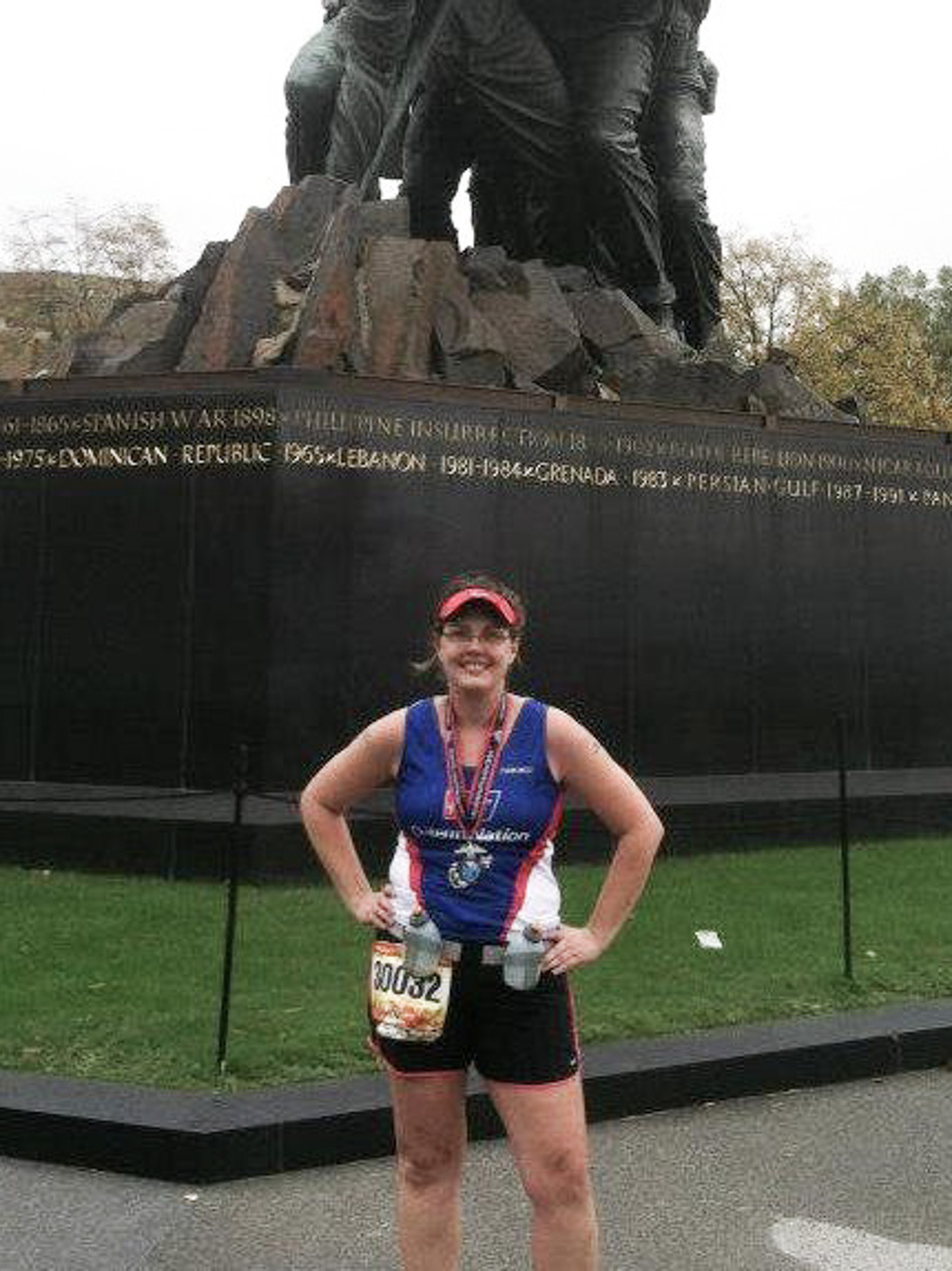 Jennifer Massey, Middle School Math teacher at McLean School, smiles at camera after running a race