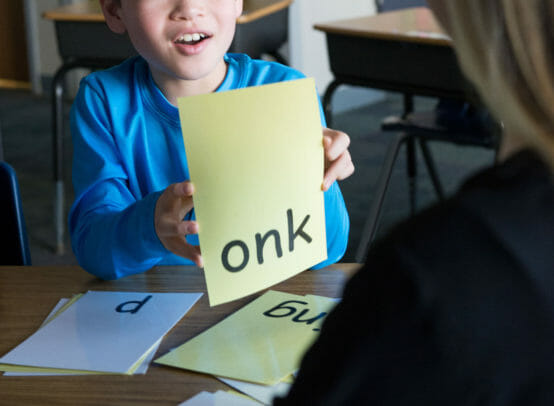 boy using flashcards to help with dyslexia