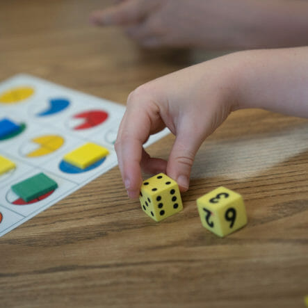 child using dice