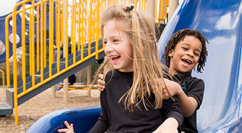 Children coming down a slide