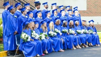 Fresh Graduates Posing for Group Photo