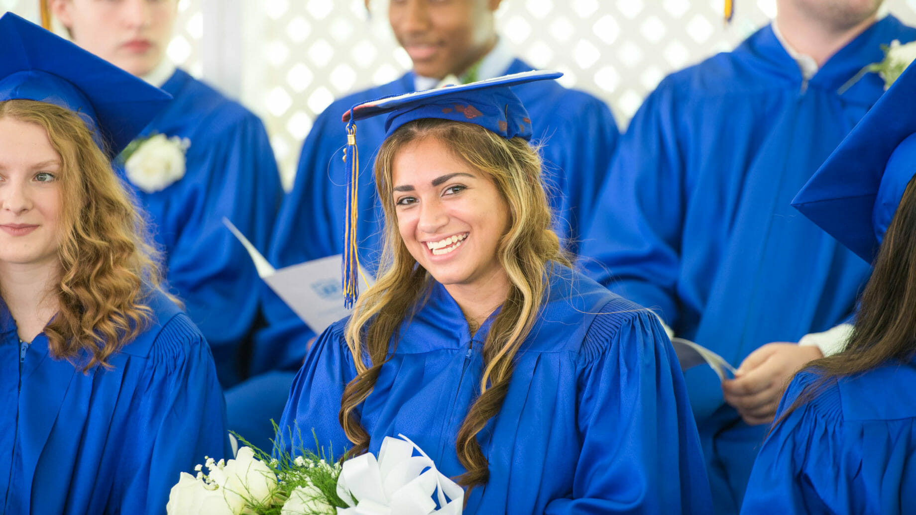 New Graduate Smiling for Camera