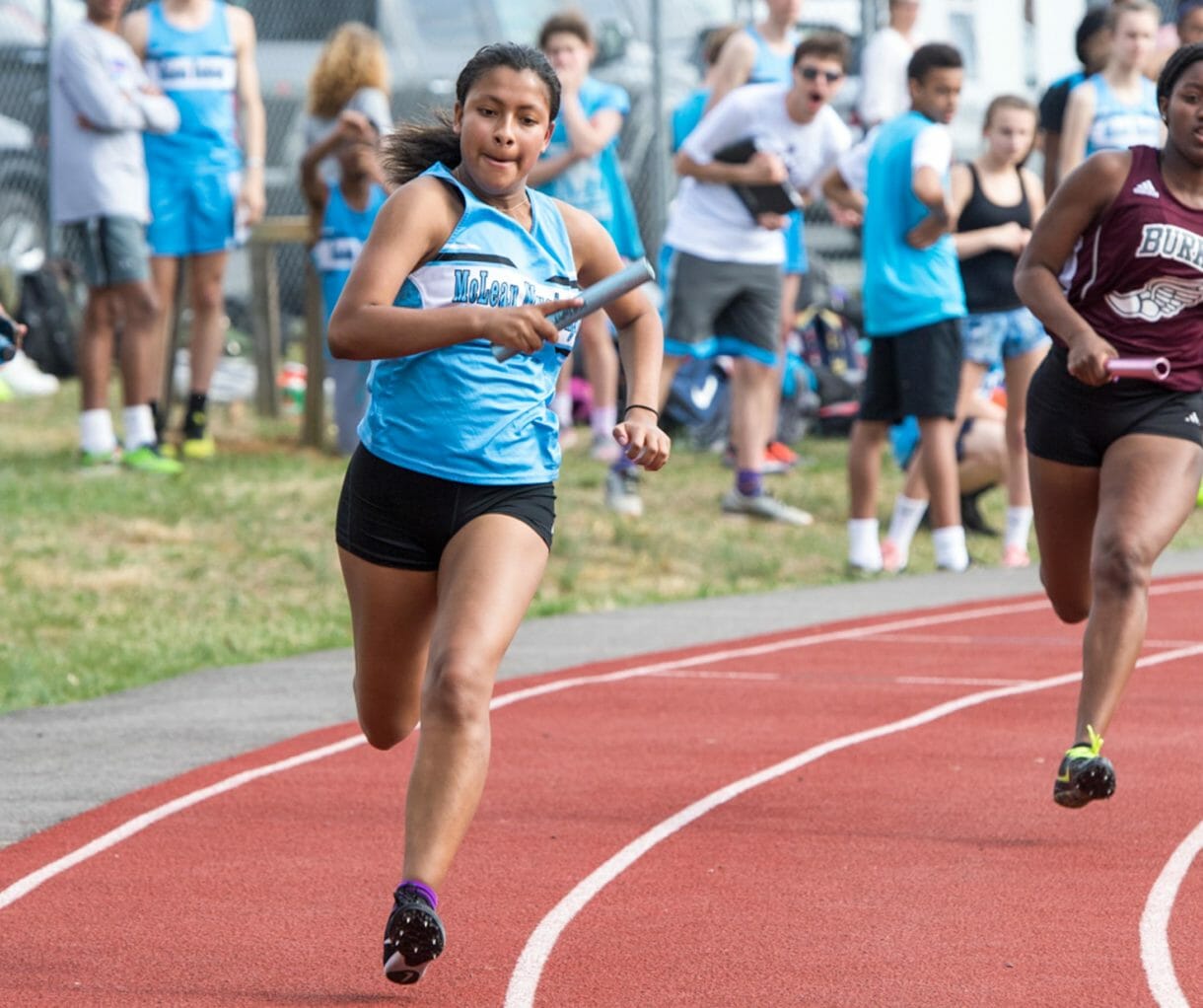 McLean varsity track and field runners on track