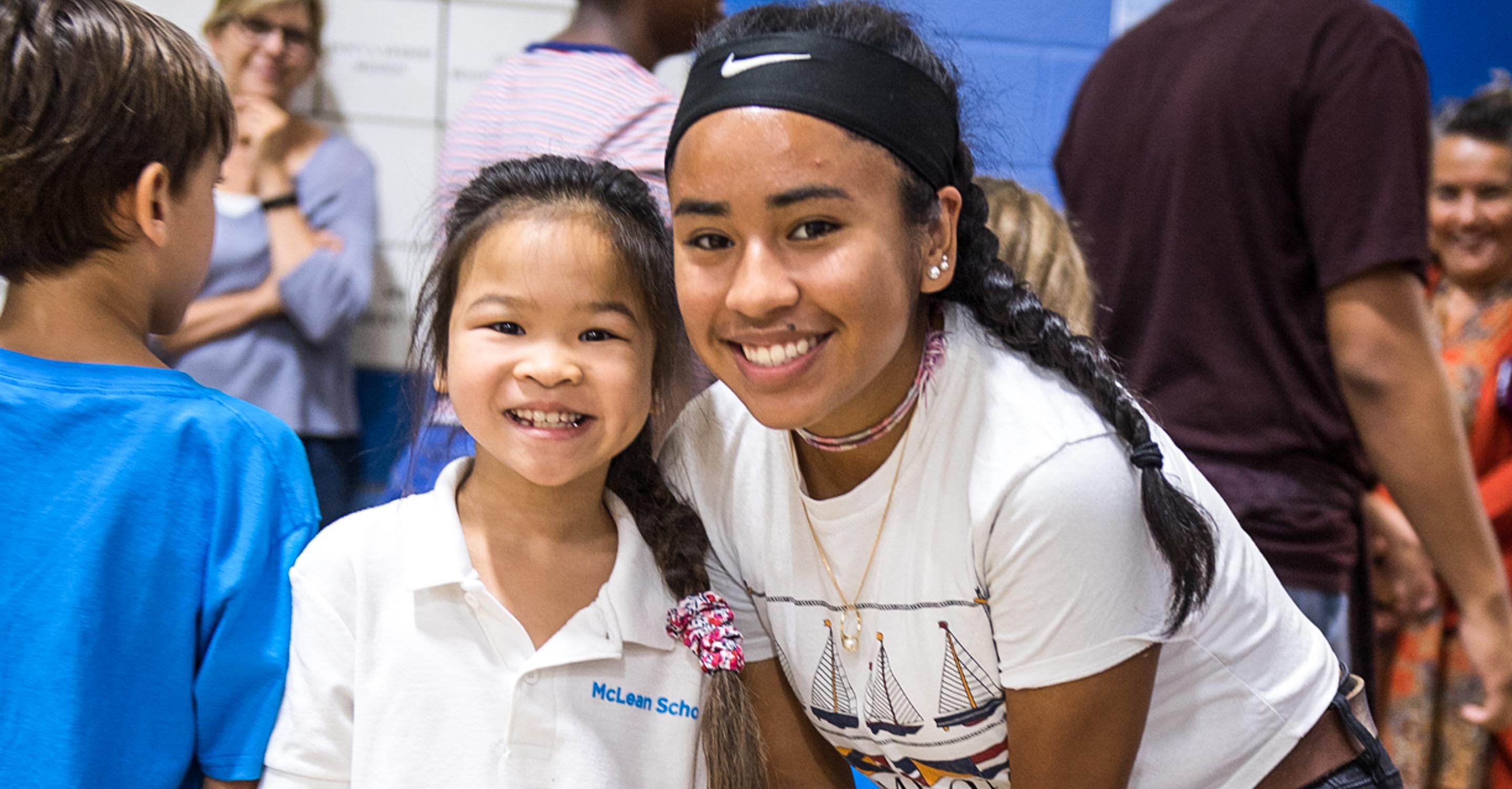 Smiling lower and upper school students