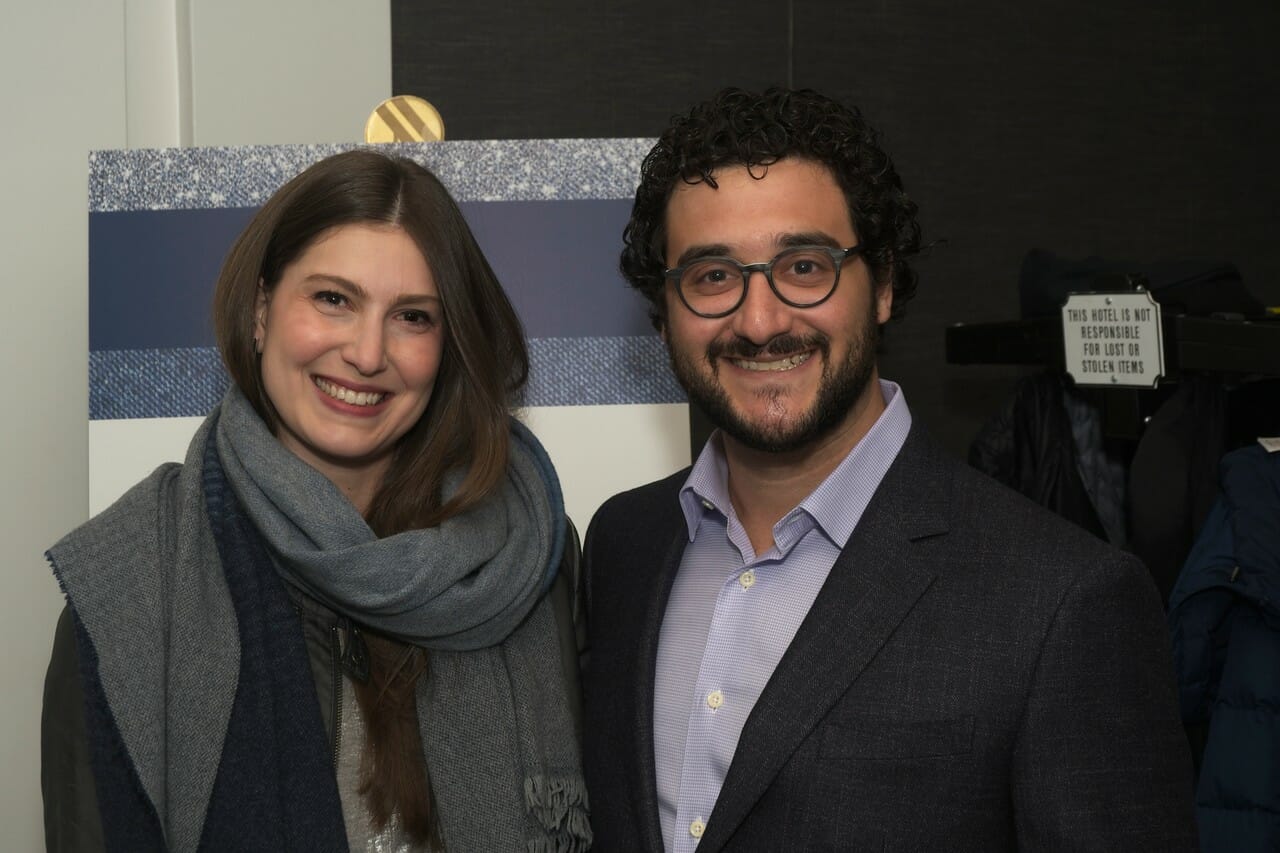 a man and a woman smiling