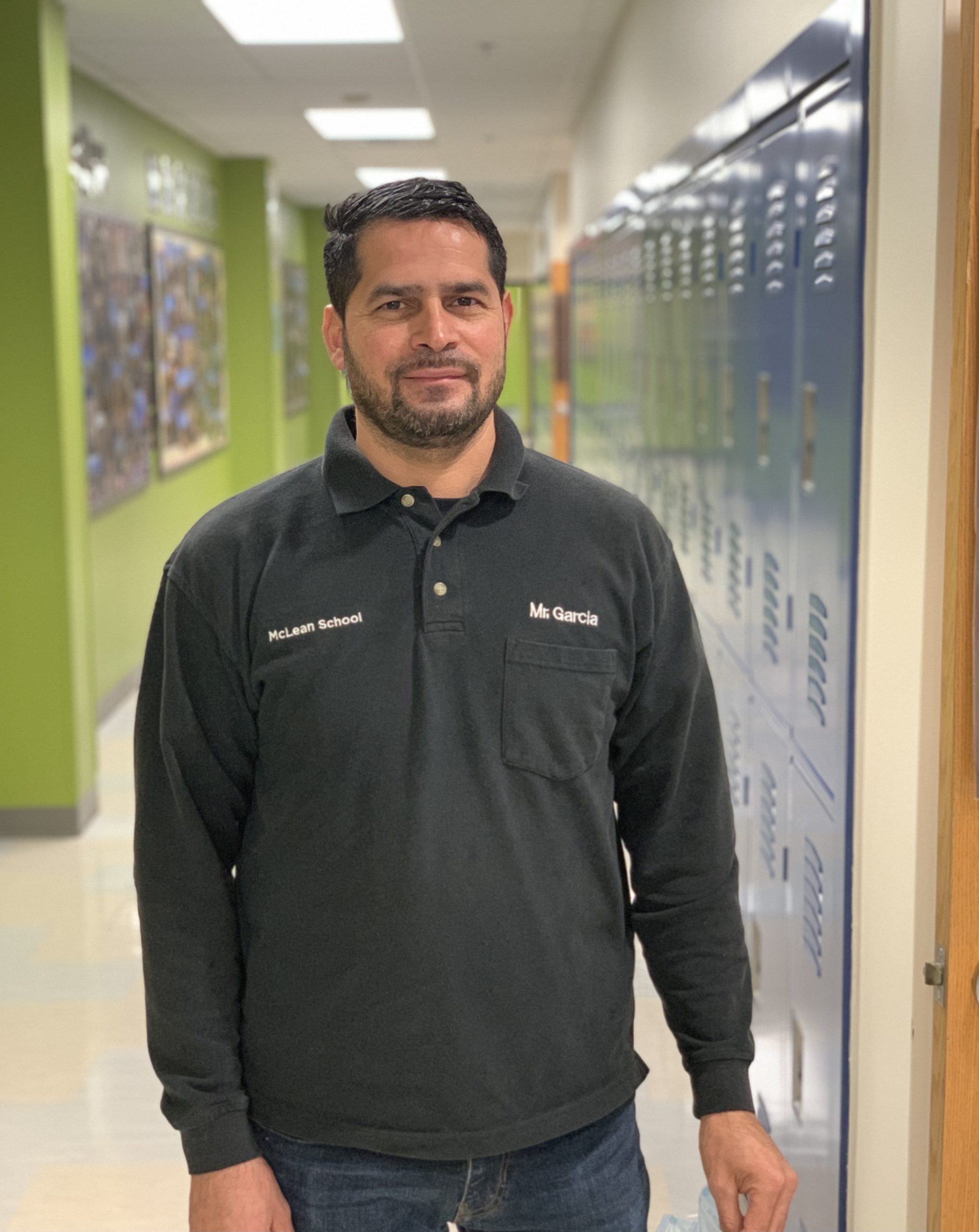 Noel Garcia, Building Facilities, smiles at camera