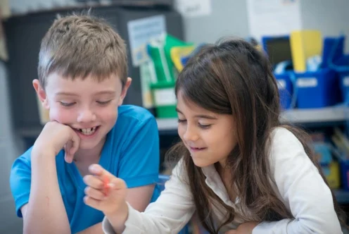 Two students using dice.