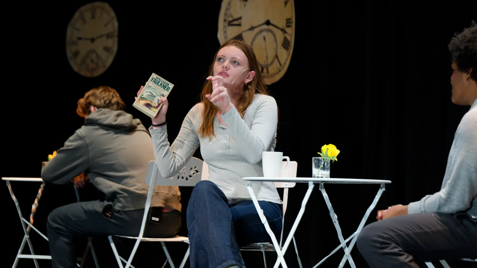 Students acting on stage.